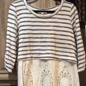 Very cute top with lace bottom.